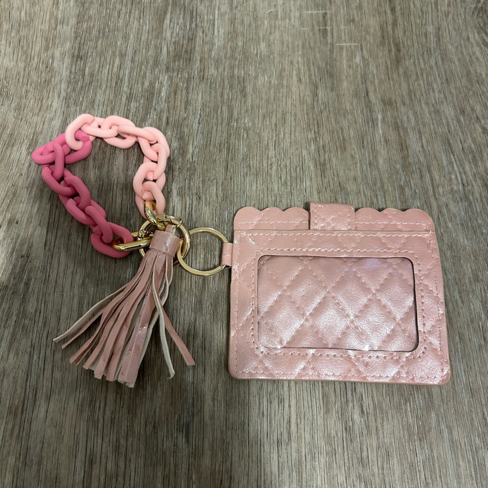 Pink wallet / card holder with two shaded wristlet, gold clasps and pink tassel